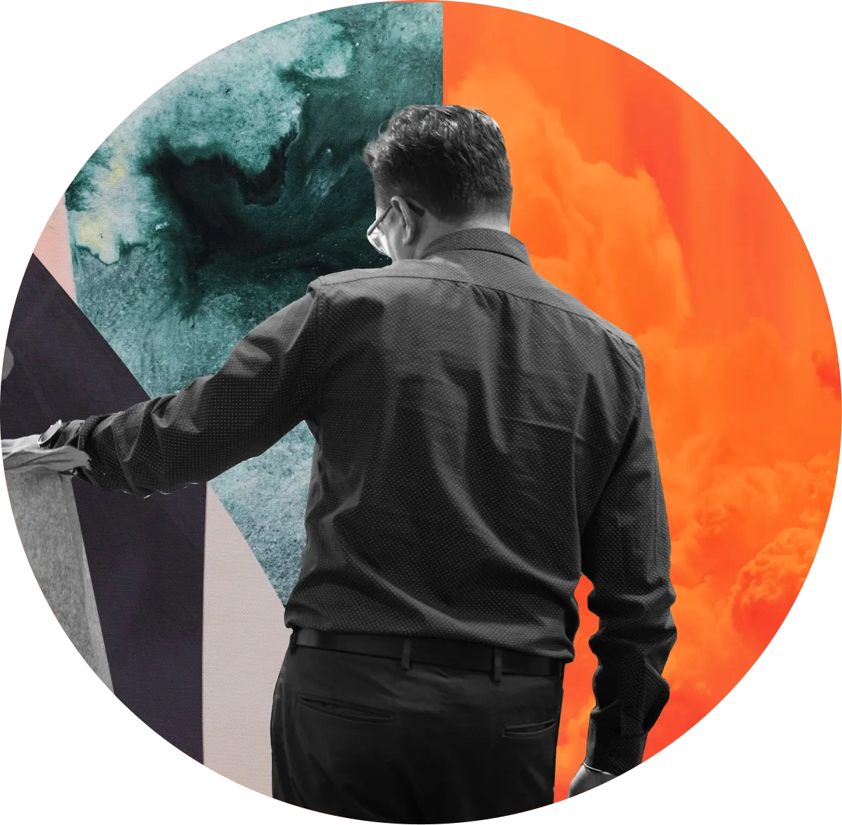 A man in a dark shirt stands facing a wall with abstract green and orange artwork, touching the surface with his left hand.